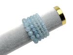 Aquamarine beaded crystal bracelet for men and women, stretchy design with healing properties, from GemstoneGO.