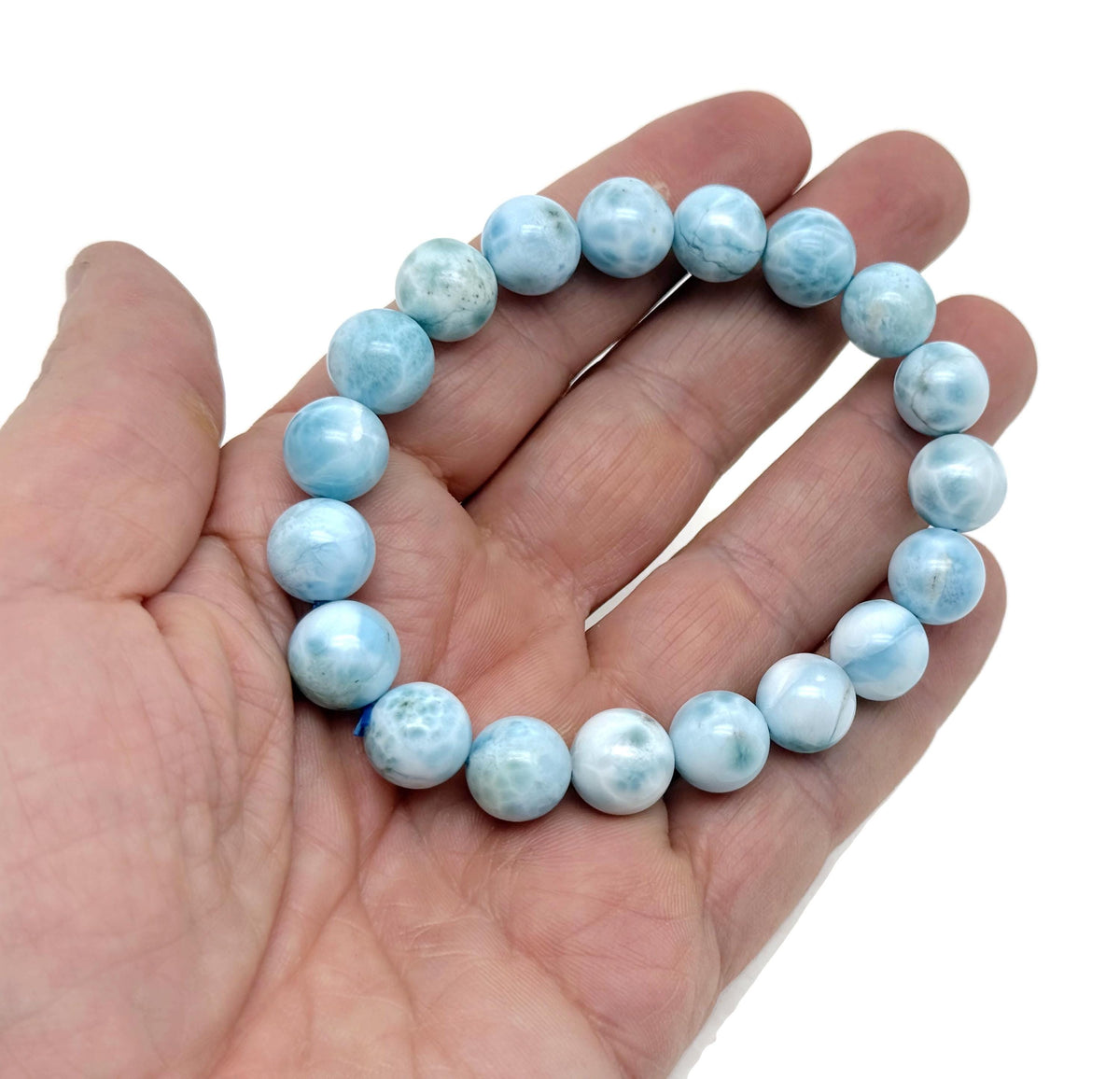 Larimar beaded crystal bracelet for men and women, stretchy jewelry featuring blue larimar stones and crystal accents.