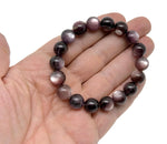 Lepidolite beaded crystal bracelet for men and women with a stretchy design, featuring polished AA-grade stones for healing and style.