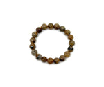 Golden rutilated quartz beaded bracelet by GemstoneGO featuring stretchy design and crystal healing properties for men and women.