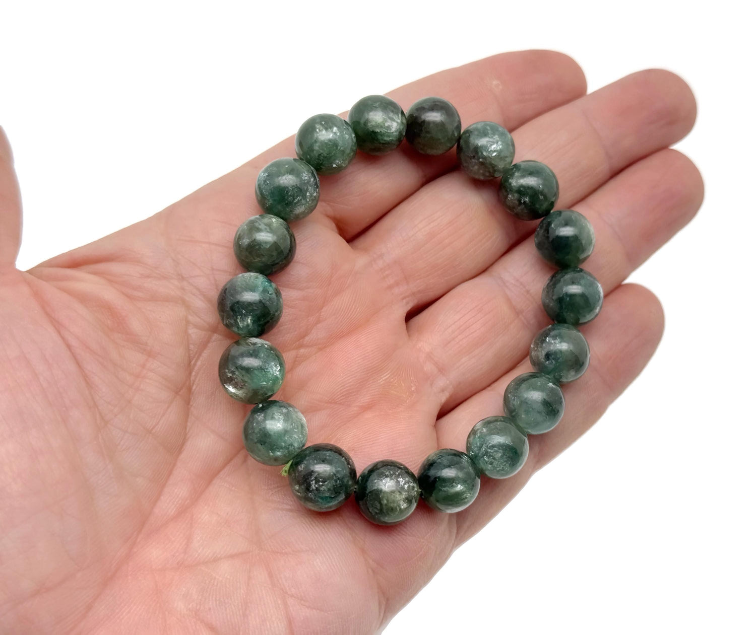Beaded crystal bracelet for men and women featuring stretchable design with AA-grade chlorite beads and healing crystal properties.