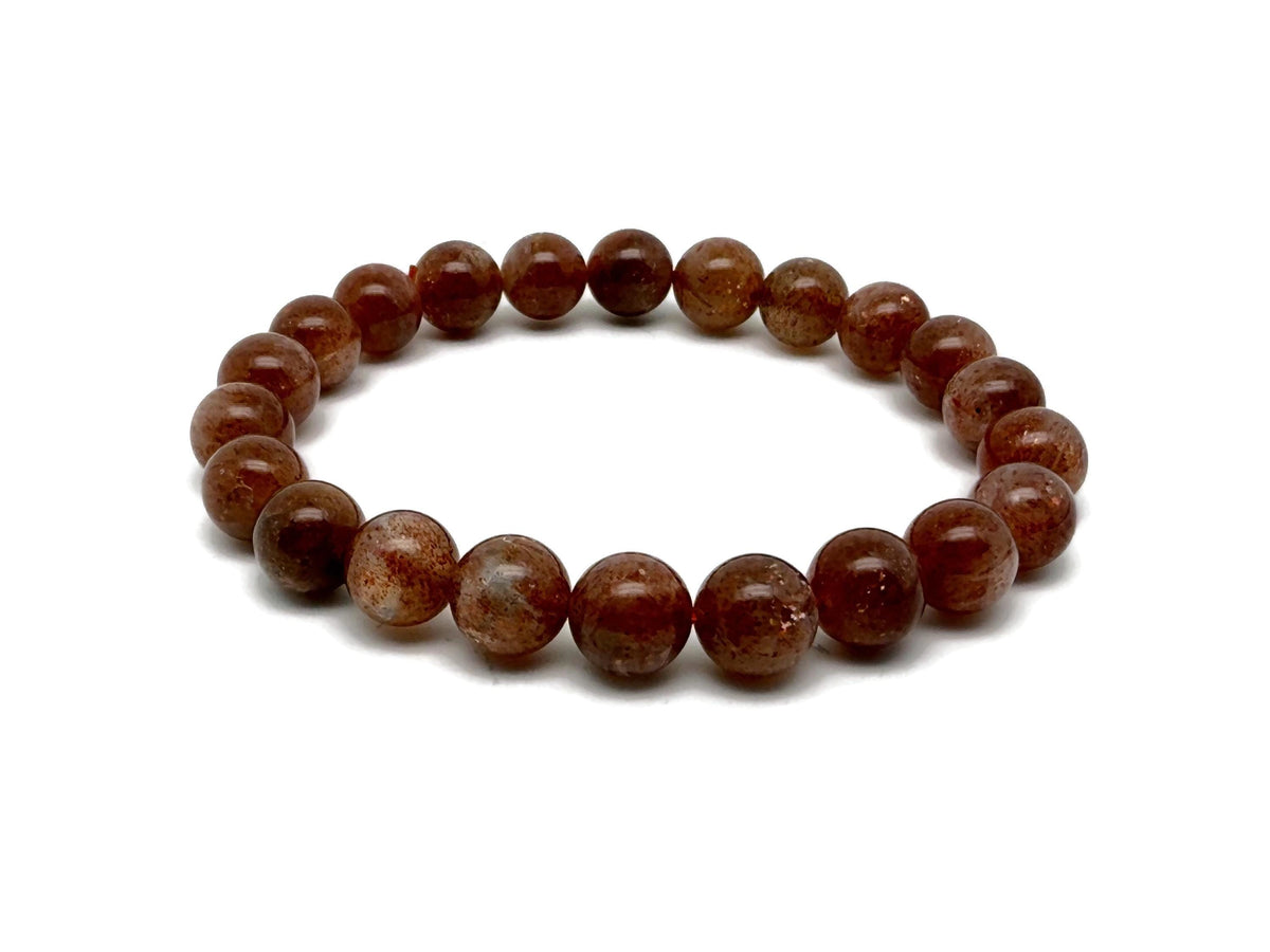 Beaded crystal healing stretch bracelet for men and women with shiny gemstone beads, showcasing a stylish and versatile accessory.