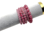 Watermelon Quartz beaded crystal bracelet for men and women, featuring stretchy design and gemstone healing properties.