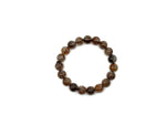Stretchy beaded crystal bracelet for men and women featuring polished Super Seven stones, ideal for crystal healing.
