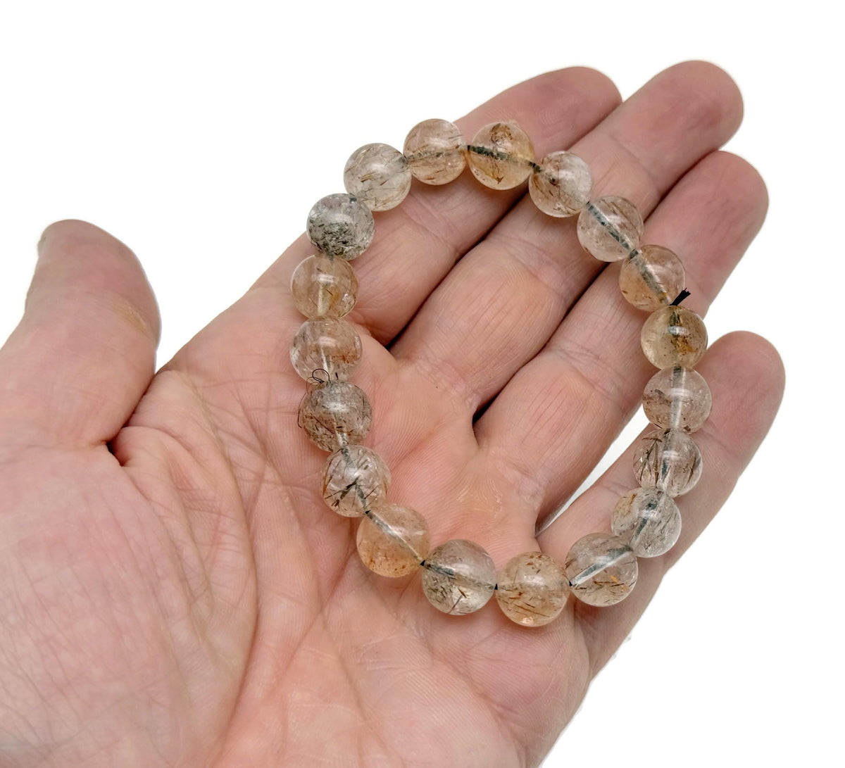 Stretchy Super Seven beaded crystal bracelet for men and women with colorful gemstone beads and crystal healing properties.