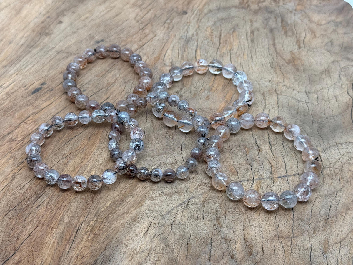 Super Seven beaded crystal bracelet by GemstoneGO, stretchy men and women jewelry with healing crystal stones.
