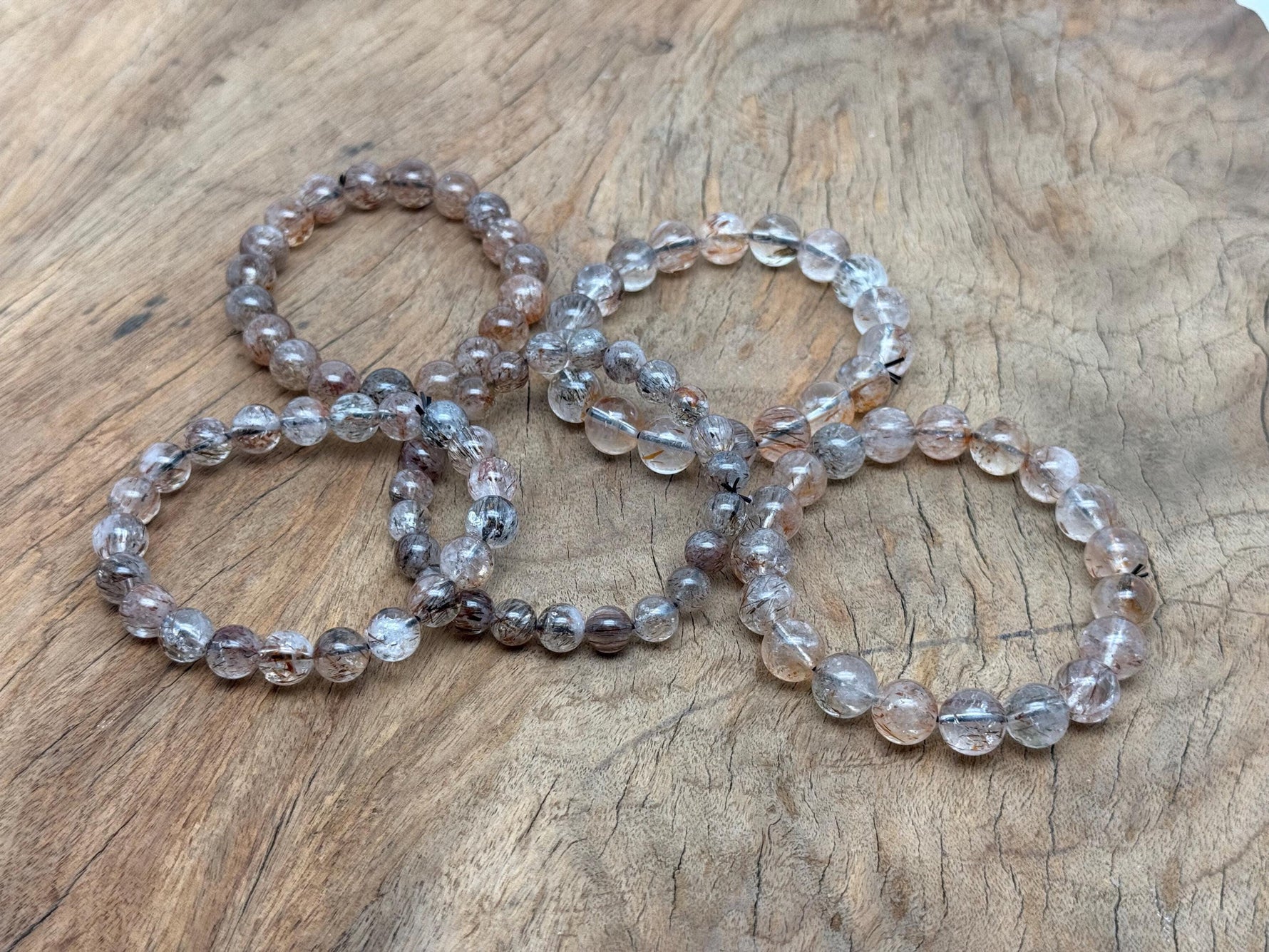 Super Seven beaded crystal bracelet by GemstoneGO, stretchy men and women jewelry with healing crystal stones.