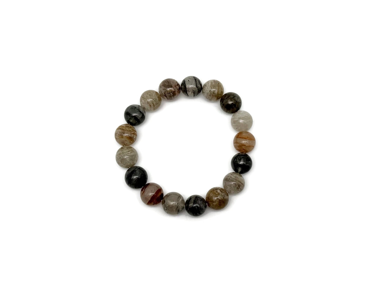 Stretchy quartz beaded crystal bracelet for men and women with healing properties, featuring polished gemstone beads.