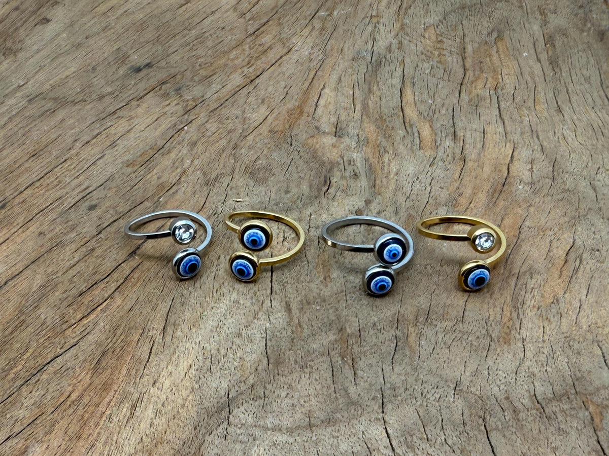 Dainty evil eye ring in gold and silver jewelry, featuring a protective evil eye design, perfect for friendship or birthday gift.