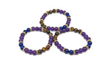 Handmade triple protection gemstone bracelet with colorful stones, designed for positive intentions and spiritual well-being.