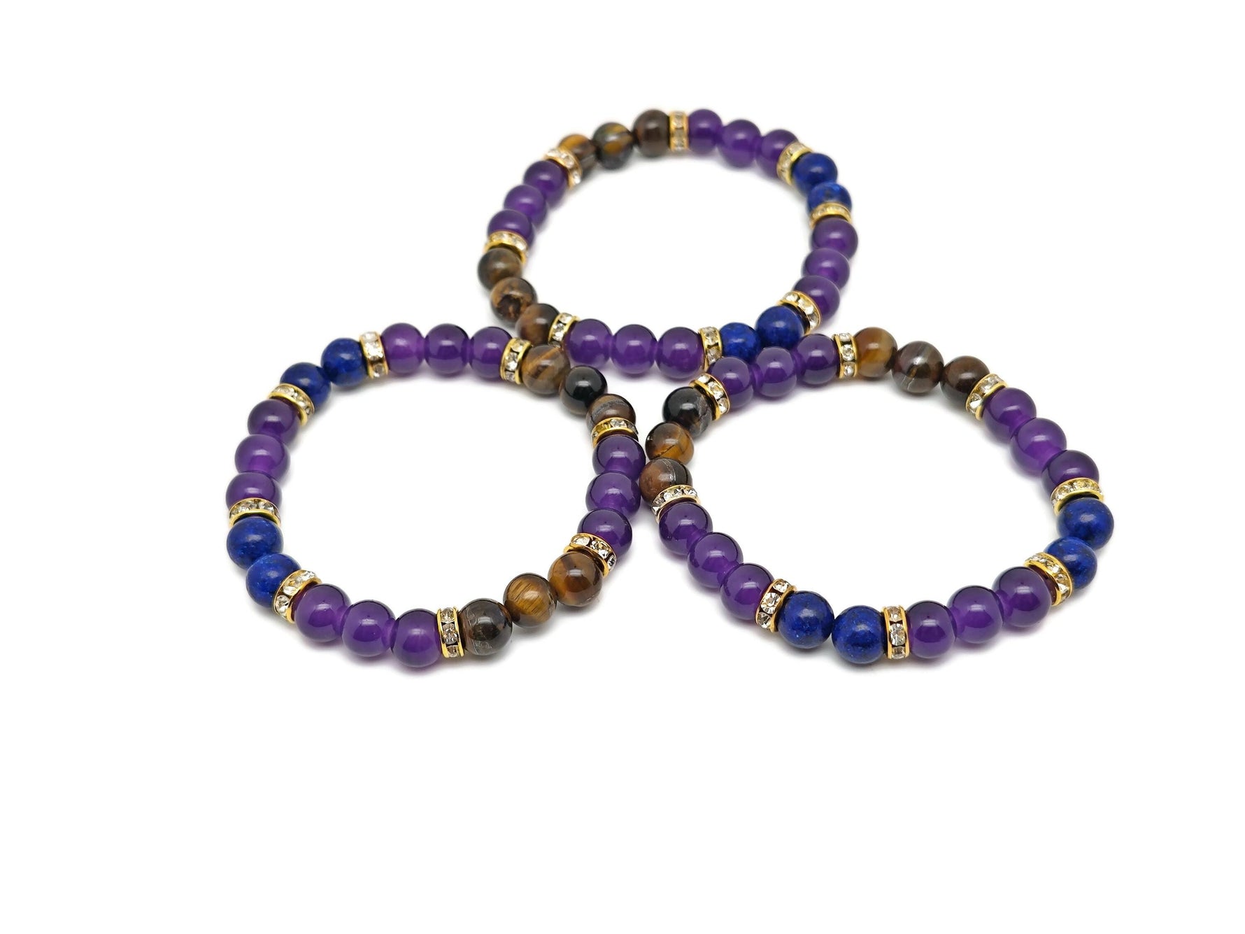 Handmade triple protection gemstone bracelet with colorful stones, designed for positive intentions and spiritual well-being.