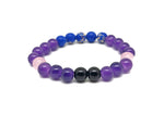Handmade emf protection gemstone bracelet with colorful stones and adjustable cord, designed for positive energy and intention.