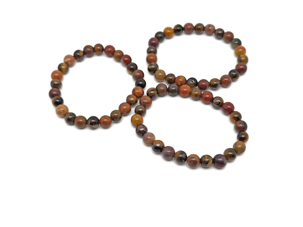 Handmade sacral chakra gemstone bracelet with vibrant orange beads, designed for intention and energy alignment by GemstoneGO.