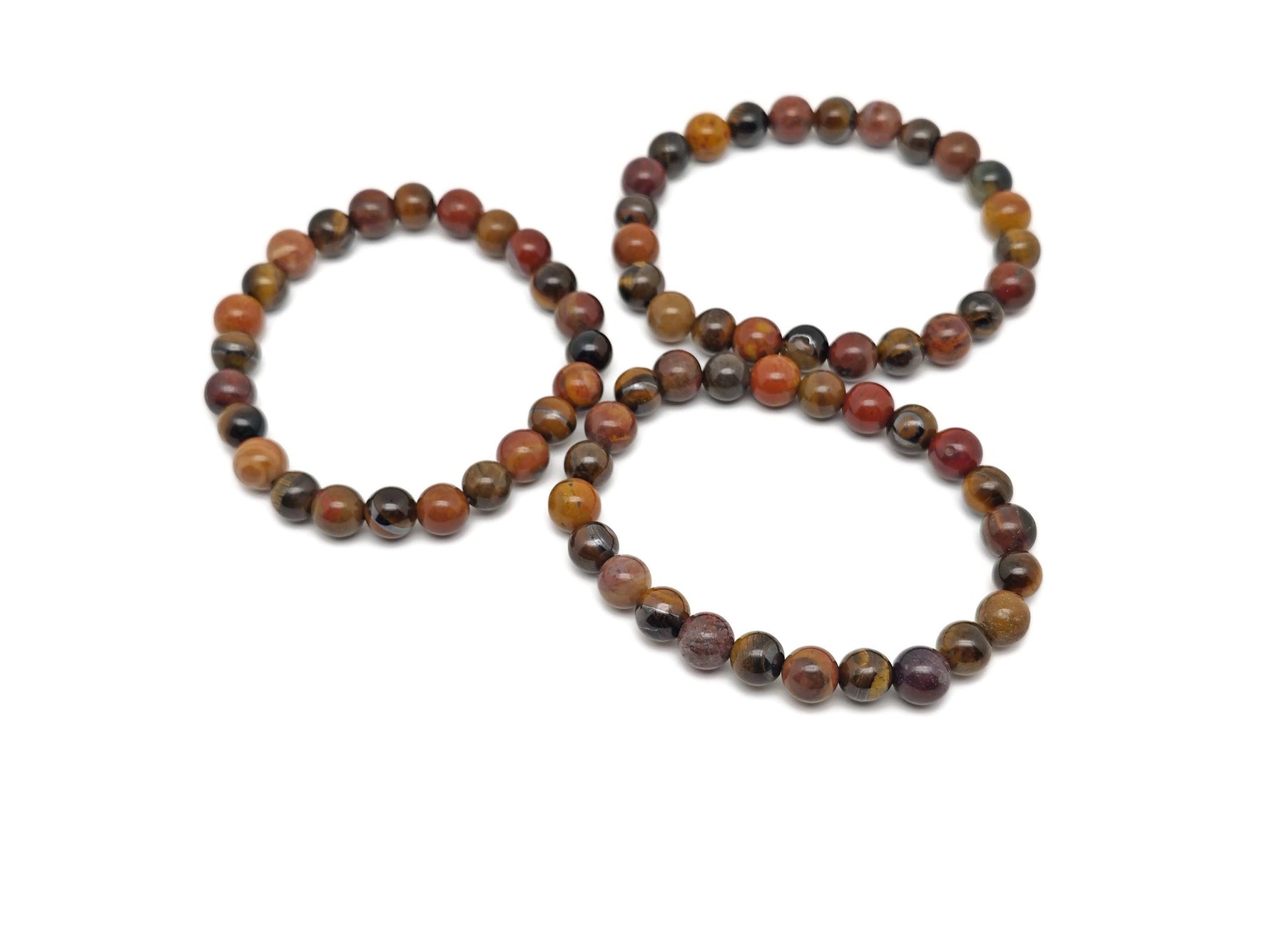 Handmade sacral chakra gemstone bracelet with vibrant orange beads, designed for intention and energy alignment by GemstoneGO.