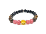 Handmade spooky gemstone bracelet featuring dark-colored stones, designed for intention and stylish accessory by GemstoneGO.