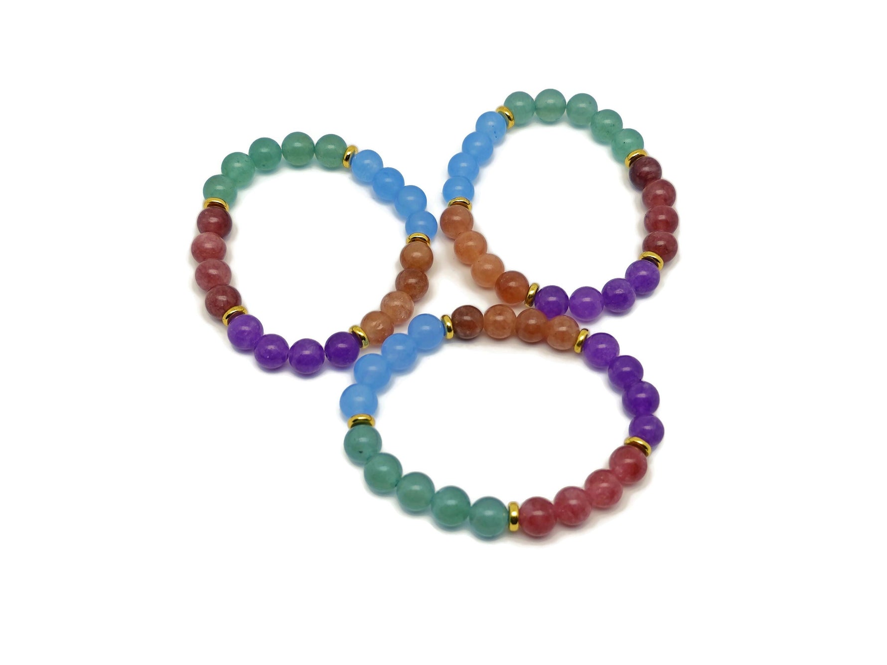 Handmade gemstone bracelet with colorful beads and a charm, designed for positive intentions and style by GemstoneGO.