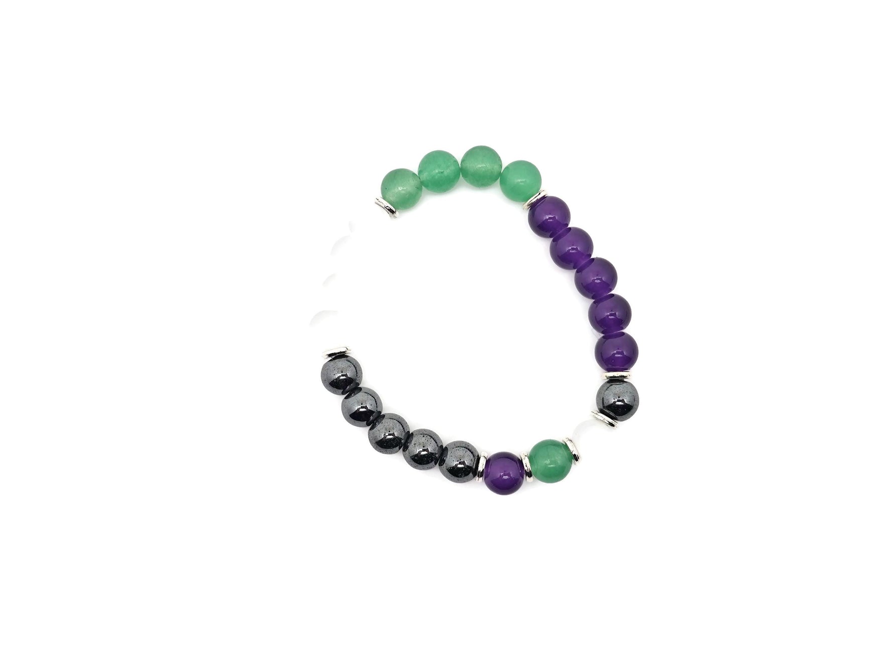 Handmade gemstone bracelet featuring colorful beads and a charm, designed for inner strength and positive intentions.