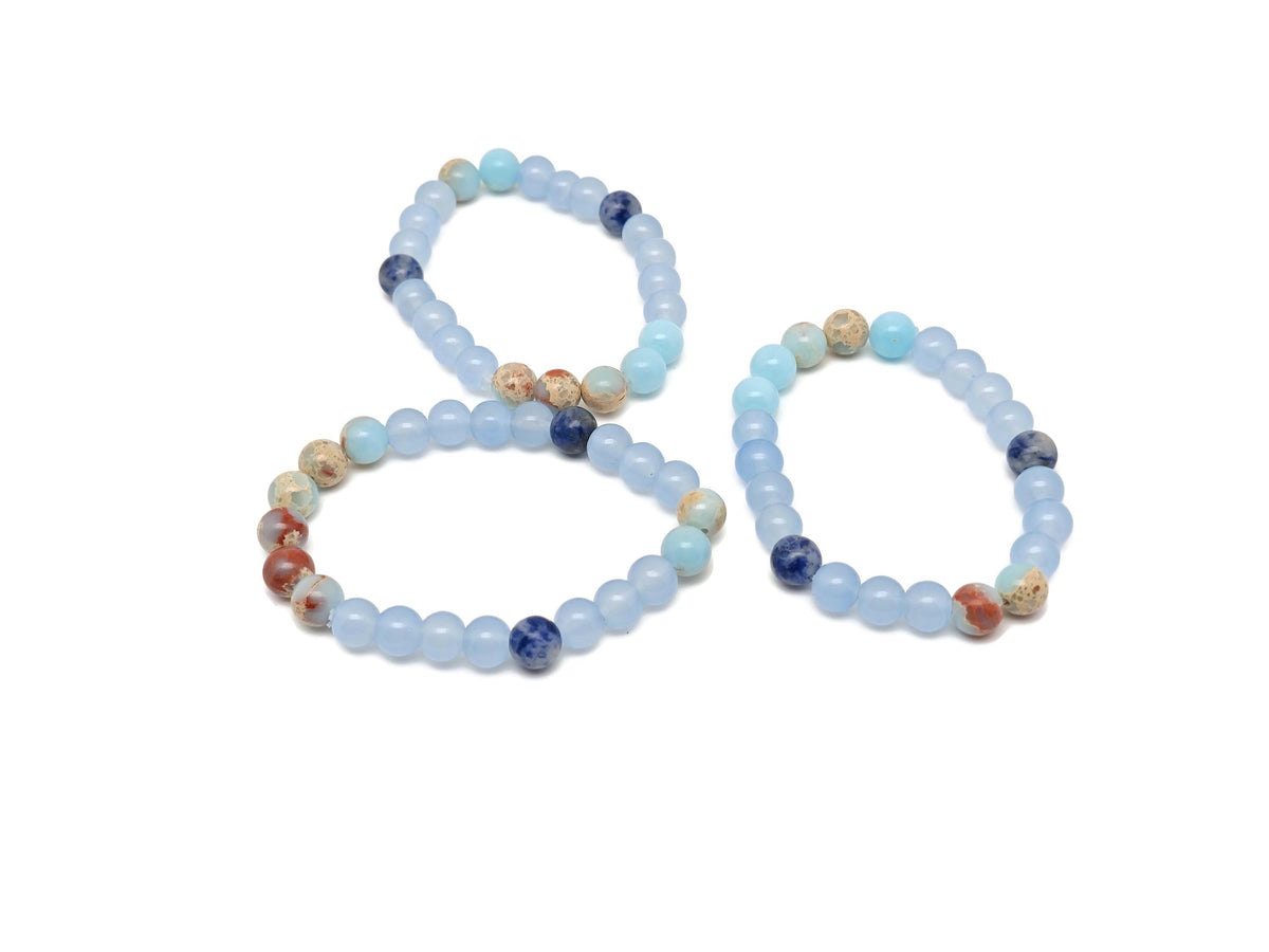 Handmade third eye chakra gemstone bracelet with colorful beads and a silver clasp, designed for intention and spiritual balance.