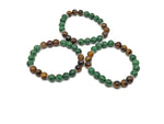 Handmade gemstone cleansing bracelet with various colorful stones, designed for positive intentions and spiritual well-being.