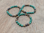 Handmade cleansing gemstone bracelet with colorful beads and natural stones, designed for intention and spiritual wellness.