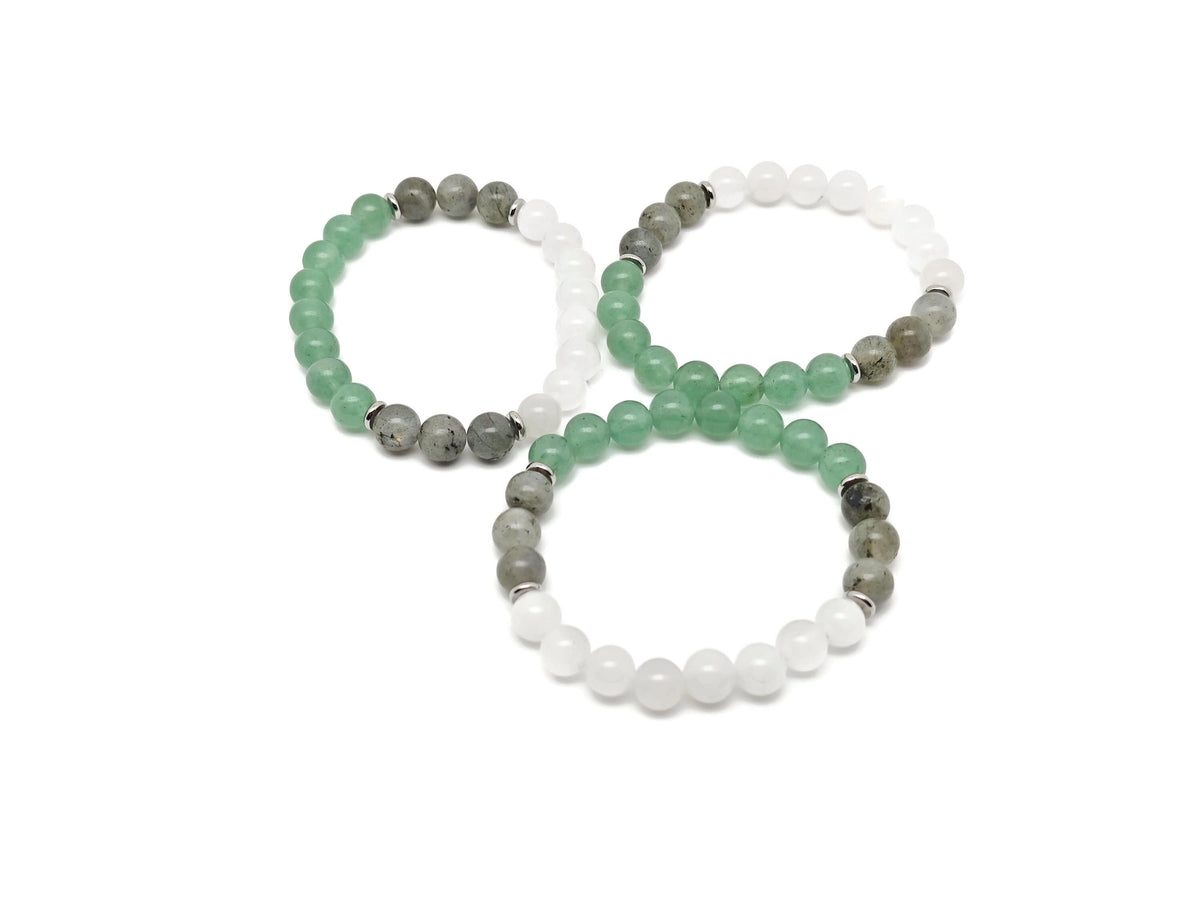 Handmade gemstone bracelet with colorful beads for good luck and fortune, featuring natural stones and adjustable design.