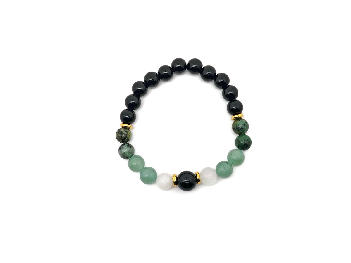 Handmade gemstone bracelet with colorful beads and charm, designed for positive intentions by GemstoneGO.