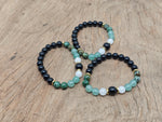 Handmade gemstone bracelet with colorful beads, featuring an intention-setting design by GemstoneGO.