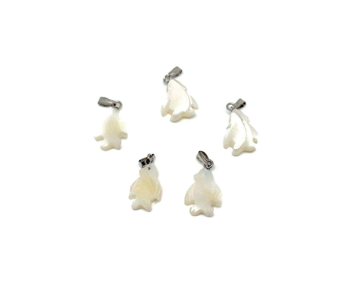Natural pearl penguin pendant with gemstone and sea shell accents, crafted by GemstoneGO, showcasing detailed jewelry craftsmanship.