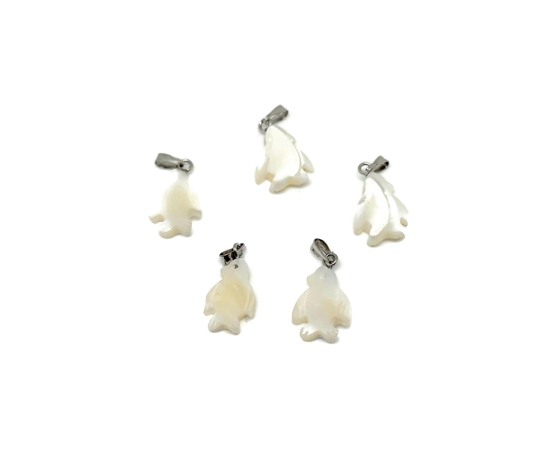 Natural pearl penguin pendant with gemstone and sea shell accents, crafted by GemstoneGO, showcasing detailed jewelry craftsmanship.