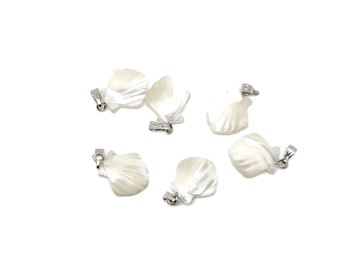 Natural pearl shell pendant from GemstoneGO, featuring a sea shell design with gemstone accents, perfect for jewelry and accessories.