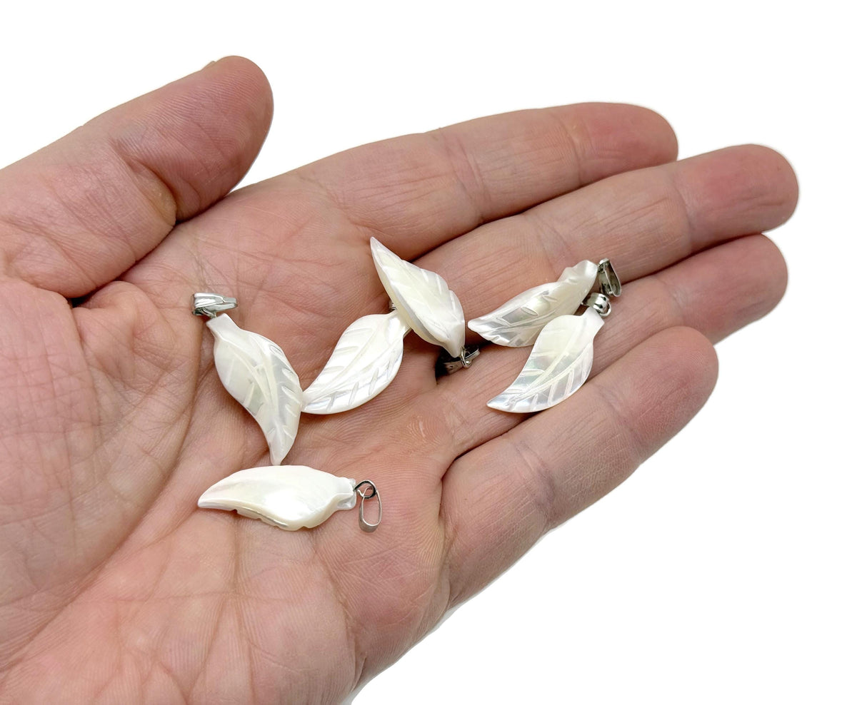 Natural pearl leaf and sea shell gemstone pendant from GemstoneGO, showcasing intricate design and vibrant colors.