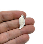 Natural pearl and sea shell leaf pendant with gemstone accents, crafted by GemstoneGO, showcasing intricate jewelry design.