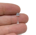 Sterling silver aquamarine stud earrings with sparkling crystal accents, featuring a beautiful blue gemstone setting.