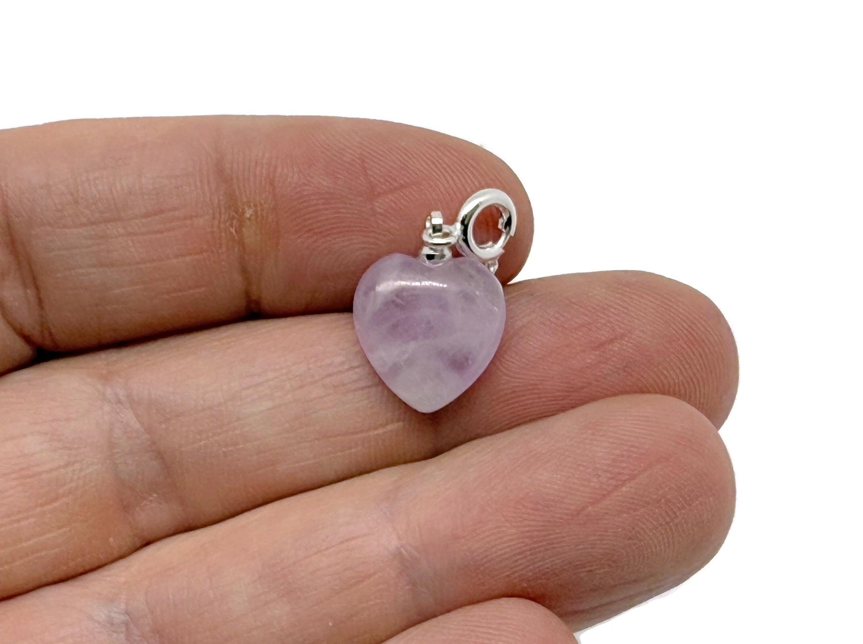 Kunzite heart-shaped crystal pendant by GemstoneGO, featuring a mini gemstone pendant with pink kunzite stone and silver chain.