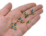 Gold and silver mini evil eye pendant featuring a protective Nazar design, crafted by GemstoneGO.