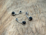 Silver stainless steel obsidian belly button ring from GemstoneGO with a sleek design for navel piercing.