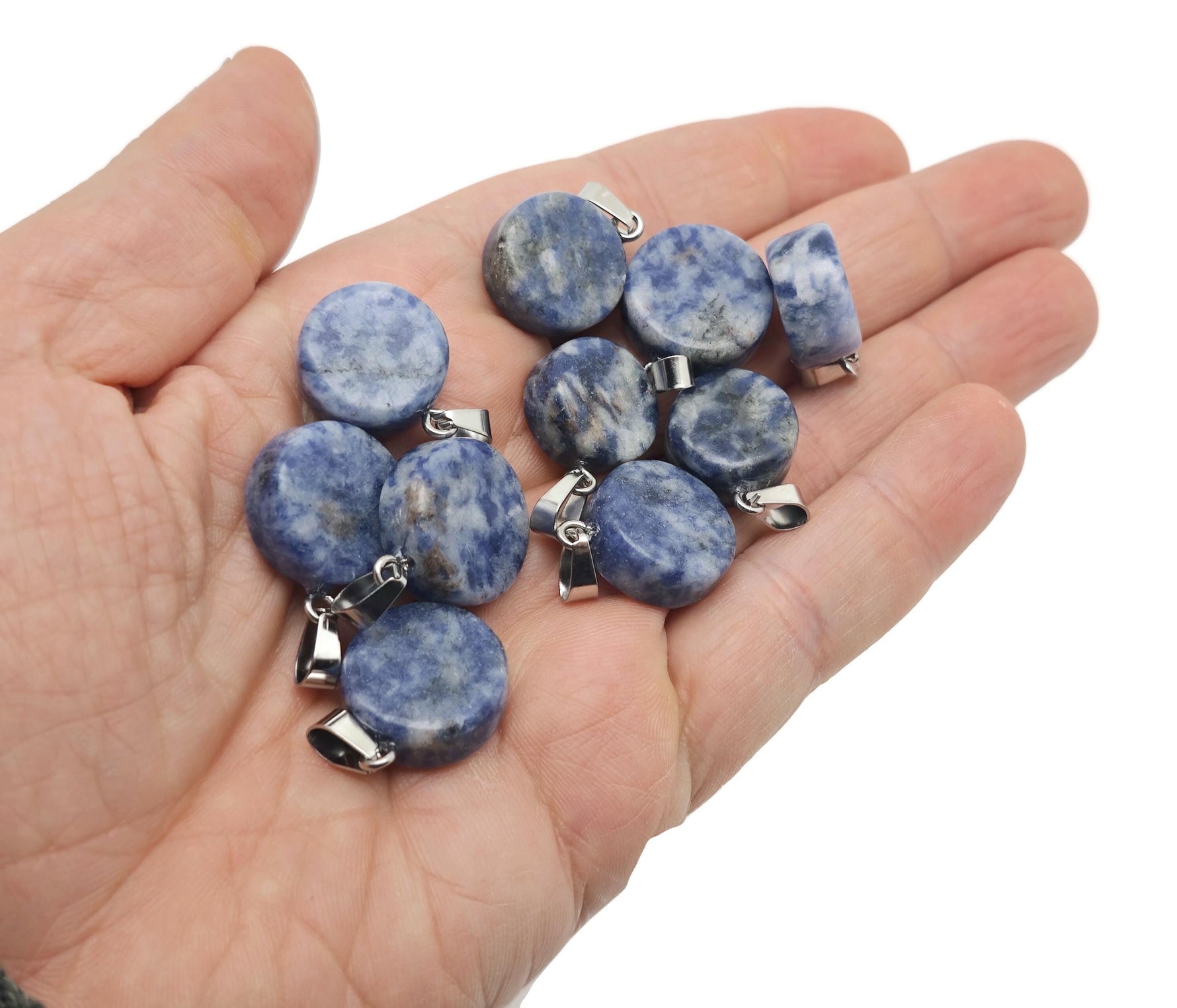 Flat round gemstone pendant featuring a crystal coin cabochon from GemstoneGO, showcasing a colorful loose gemstone.