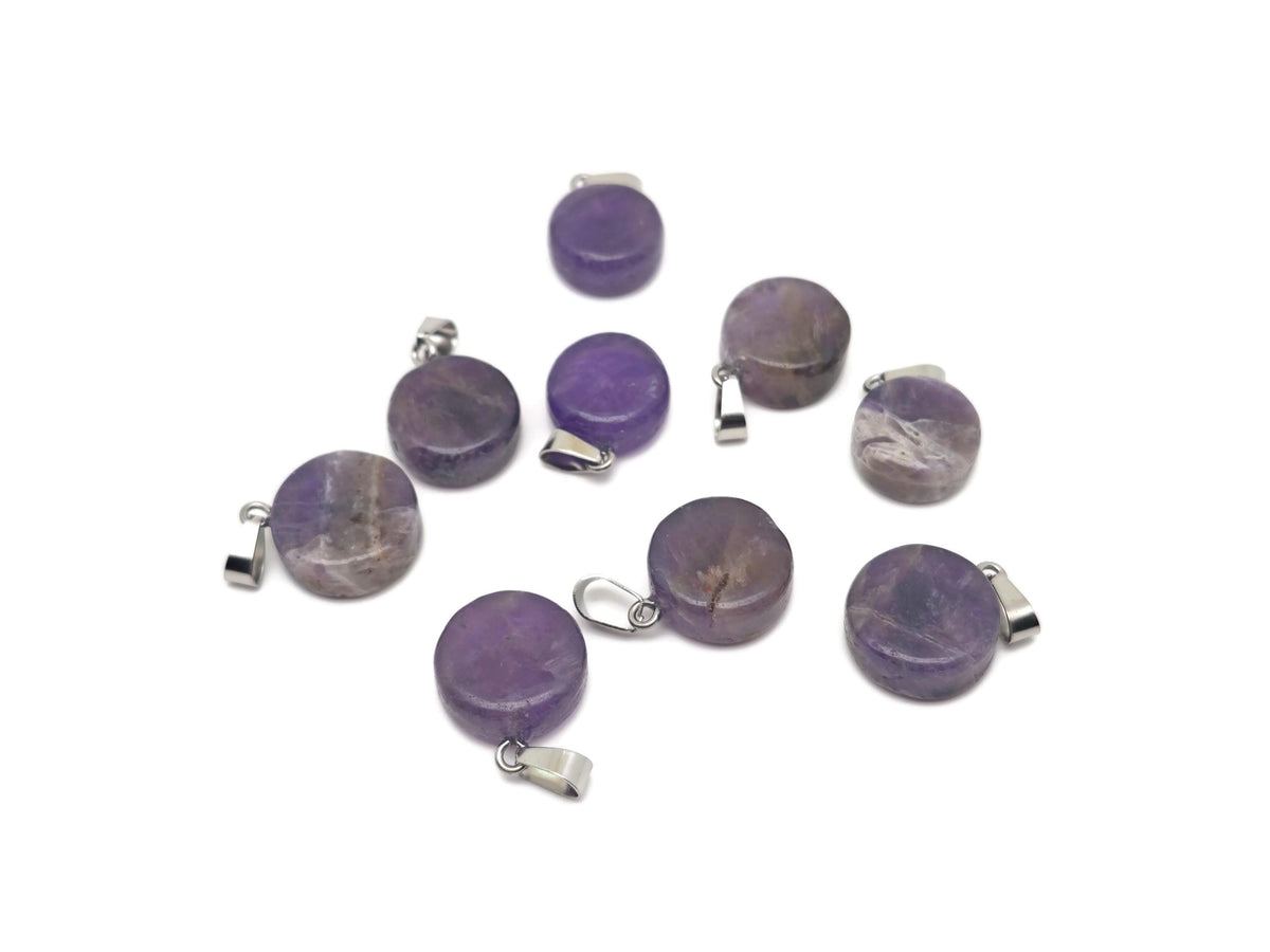Amethyst flat round gemstone pendant with a crystal coin design, featuring a polished purple amethyst stone on a silver setting.