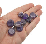 Amethyst flat round gemstone pendant with crystal round coin design, showcasing a vibrant purple gemstone on a jewelry chain.