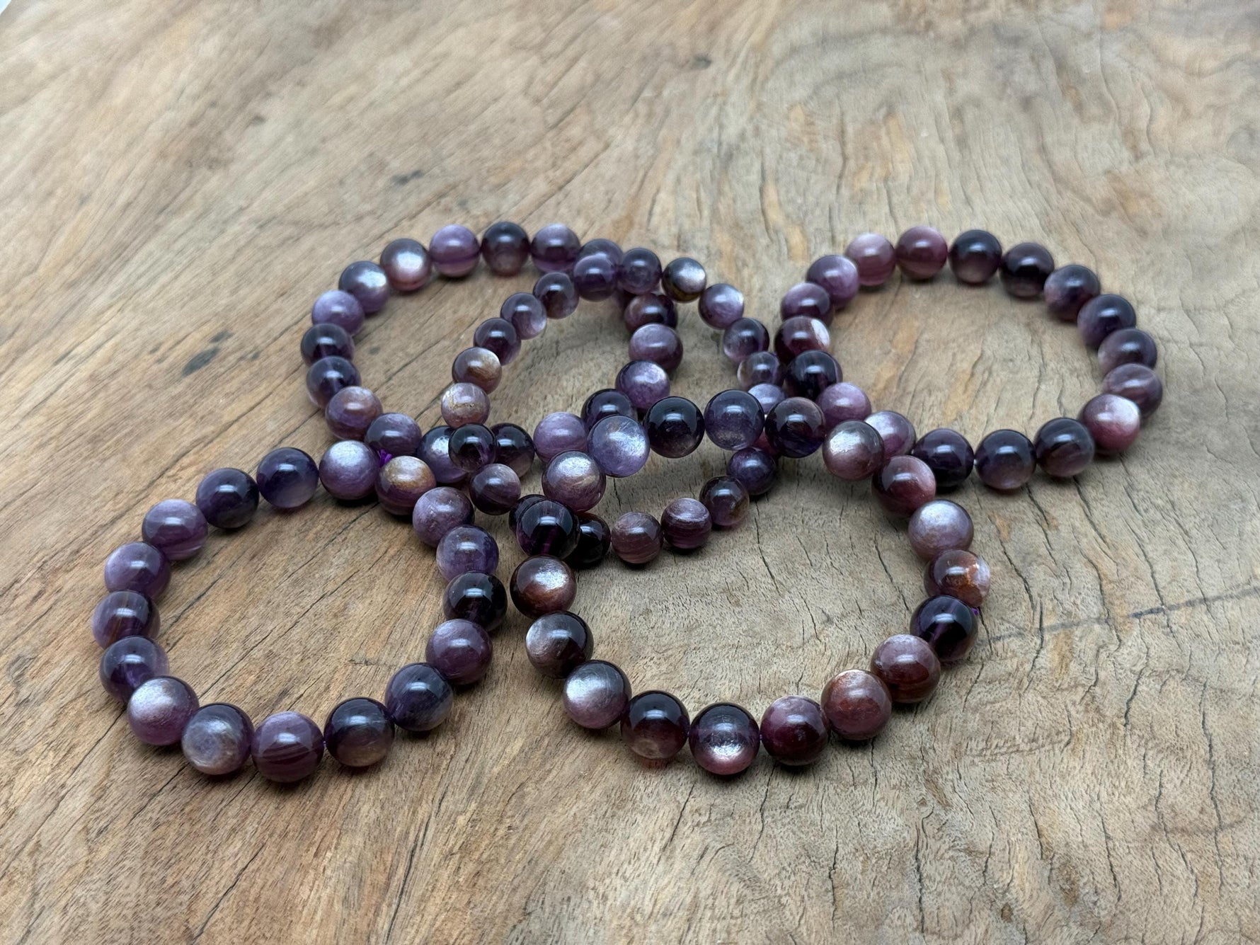 Lepidolite beaded crystal bracelet for men and women, stretchy jewelry with healing properties, featuring AA1006 gemstone beads.