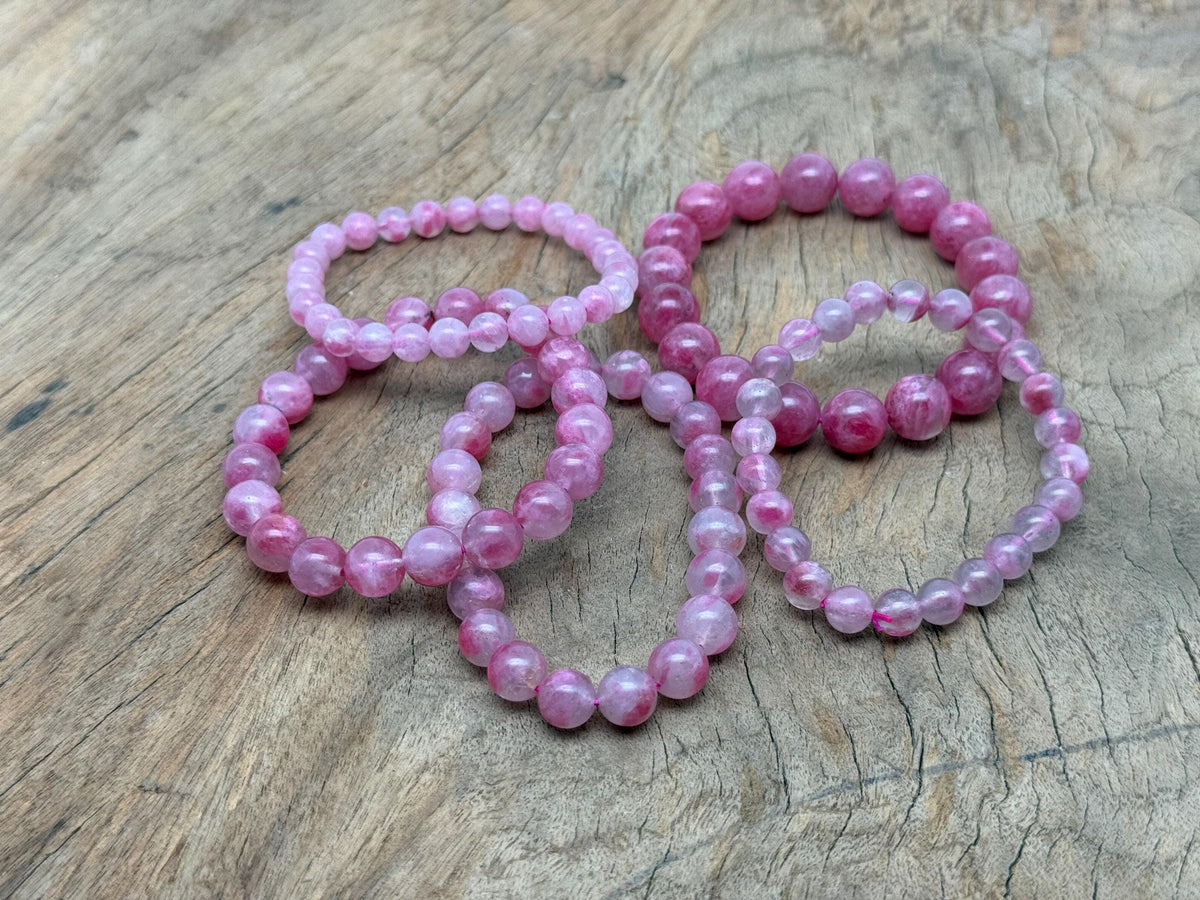 Watermelon Quartz beaded crystal bracelet for men and women, featuring stretchy design and healing properties.