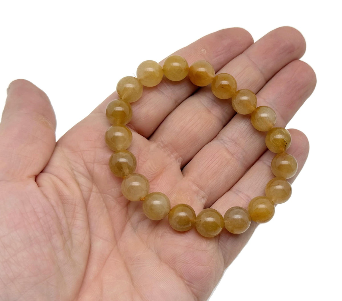 Yellow sapphire beaded crystal bracelet for men and women, stretchy design with crystal healing properties, from GemstoneGO.