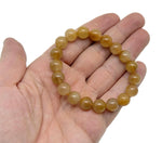 Yellow sapphire beaded crystal bracelet for men and women, stretchy design with crystal healing properties, from GemstoneGO.