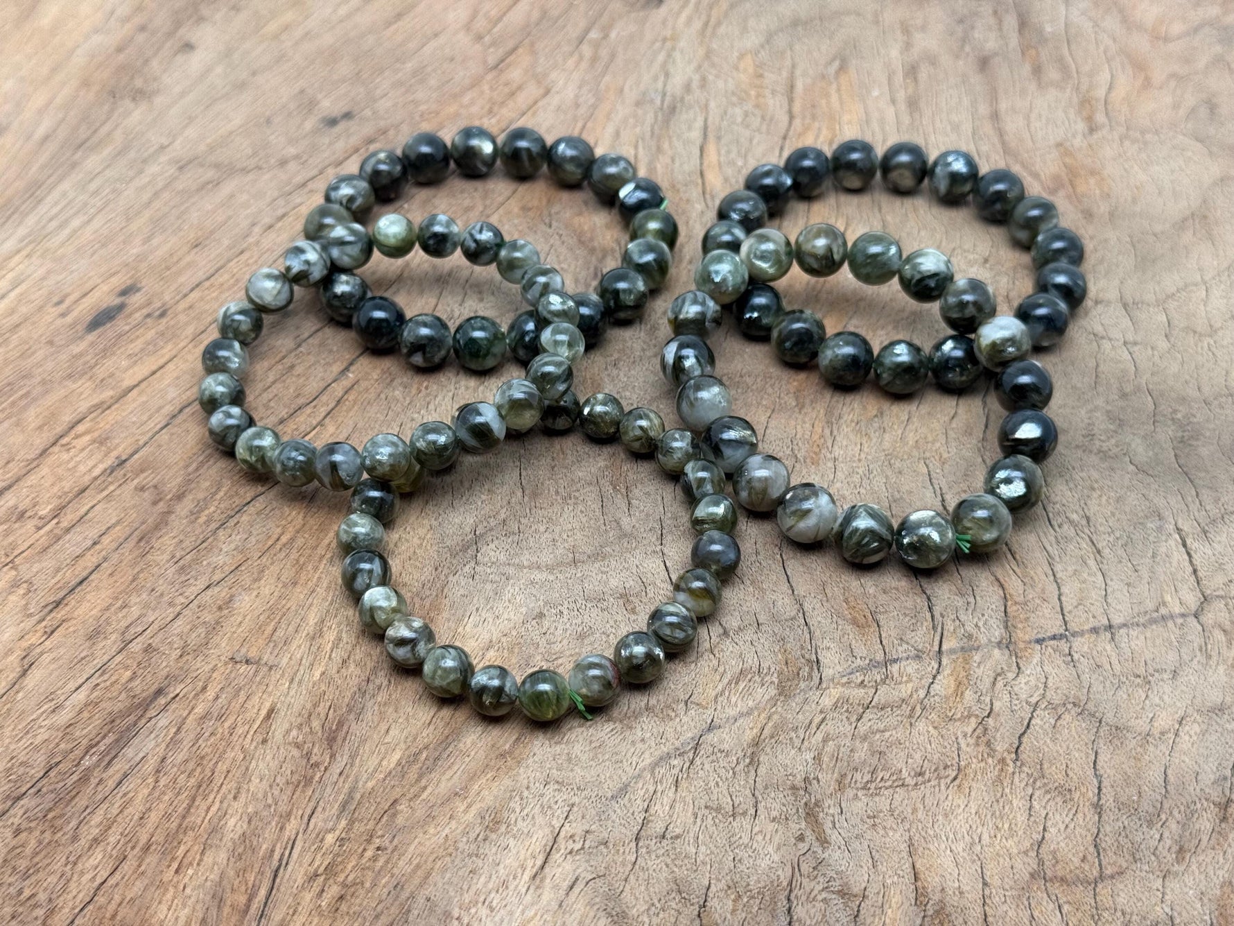 Green Lepidolite beaded crystal bracelet with stretchy band, suitable for men and women, featuring healing gemstones.