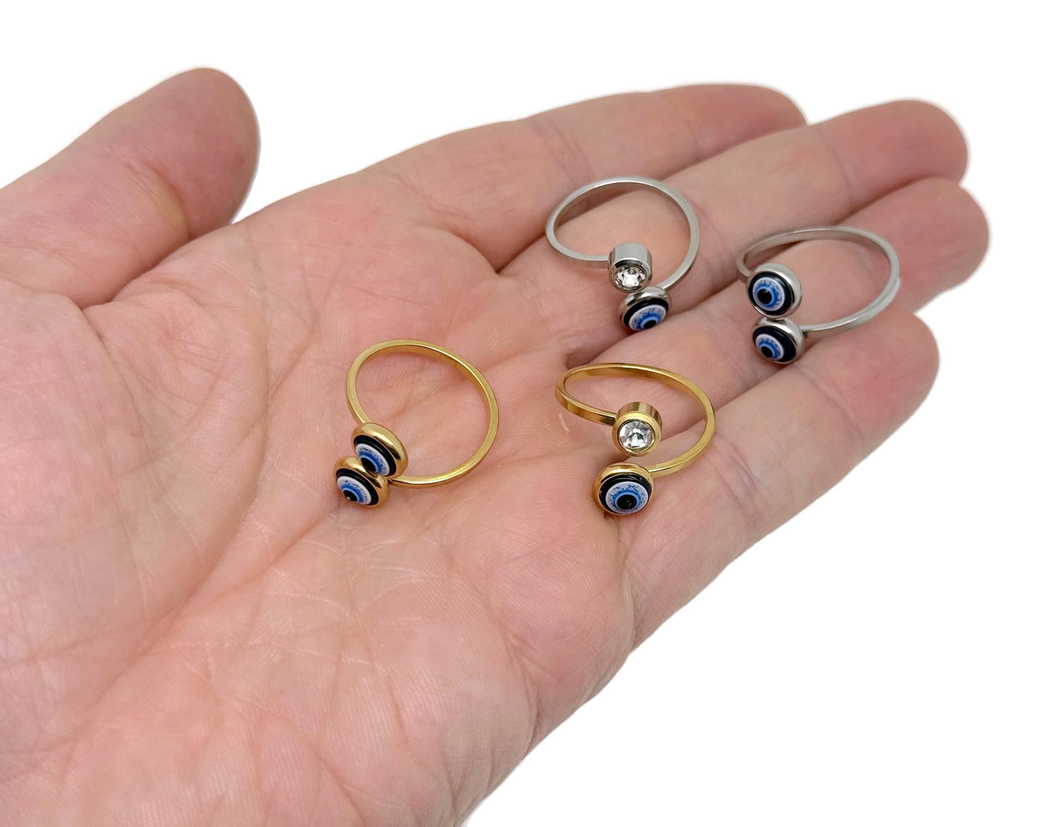 Dainty evil eye ring in gold and silver, featuring intricate gemstone details, perfect for friendship or birthday jewelry.