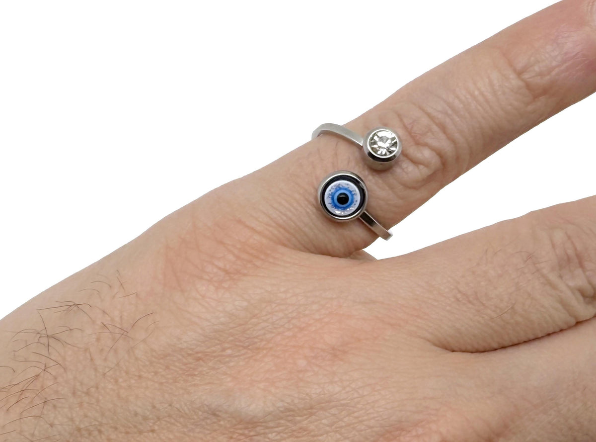 Gold and silver dainty evil eye ring from GemstoneGO, featuring intricate jewelry design for friendship or birthday gift.