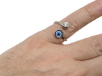 Gold and silver dainty evil eye ring from GemstoneGO, featuring intricate jewelry design for friendship or birthday gift.