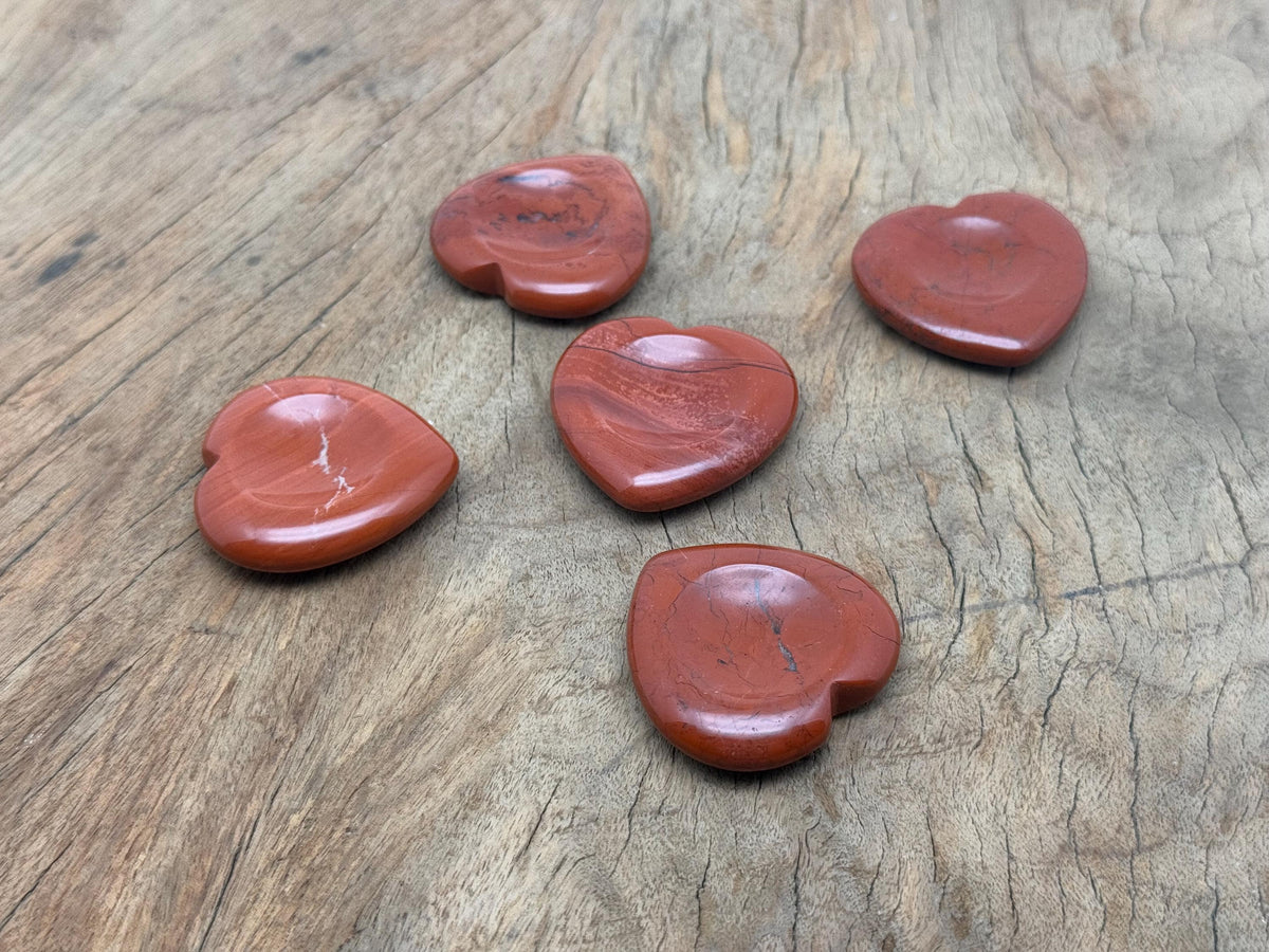 Red Jasper heart worry stone from GemstoneGO, a soothing crystal with polished surface and natural red gemstone appearance.