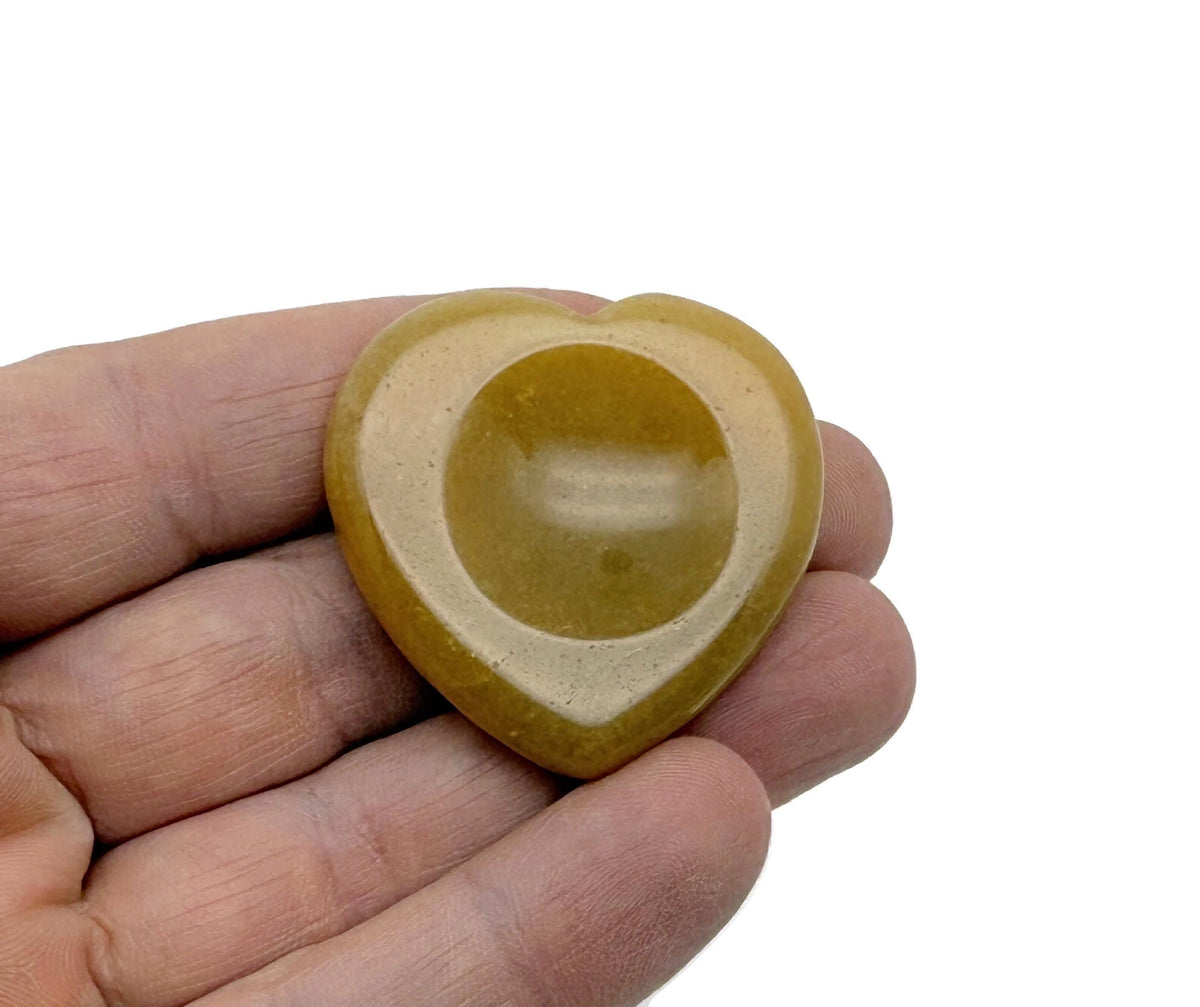 Yellow jade heart worry stone from GemstoneGO, a soothing crystal with polished surface, perfect for stress relief and meditation.