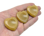 Yellow jade heart worry stone from GemstoneGO, featuring a smooth, soothing crystal with polished yellow jade finish.